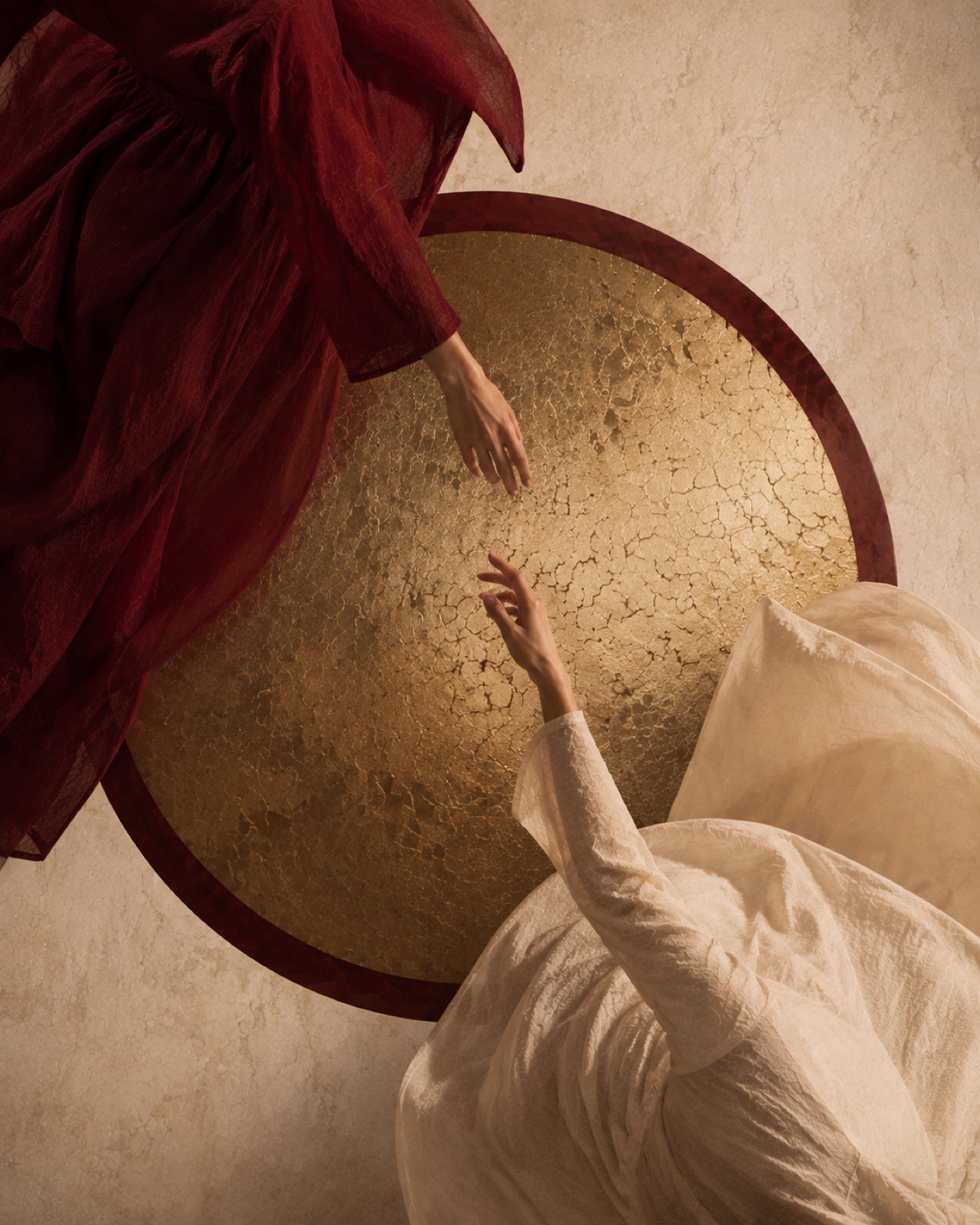 A guided embodied Tantra practice in warm burgundy and gold light